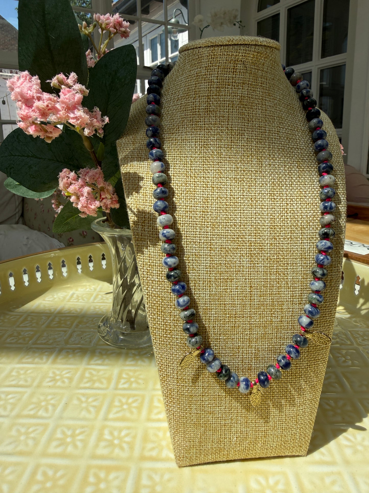The Soraya strand with gold accents